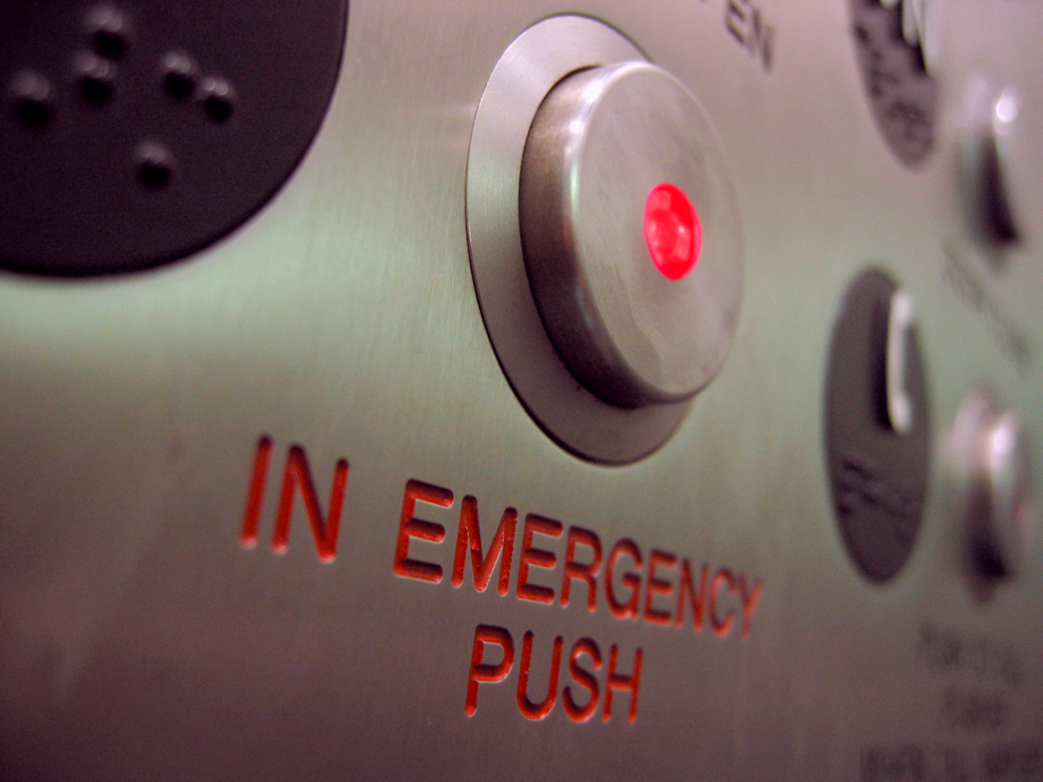 Evacuation lift emergency button